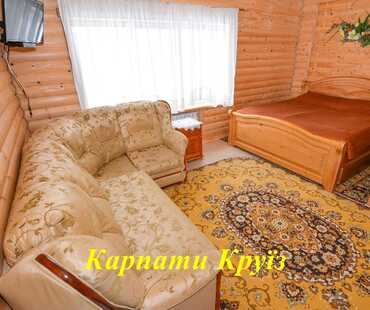 Готель «Козацький Дворик» - Тримісний номер з двоспальним ліжком та м'яким кутком - 21 м2.